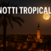 Città italiana di notte con temperature tropicali e umidità elevata, cielo sereno e luci cittadine riflesse